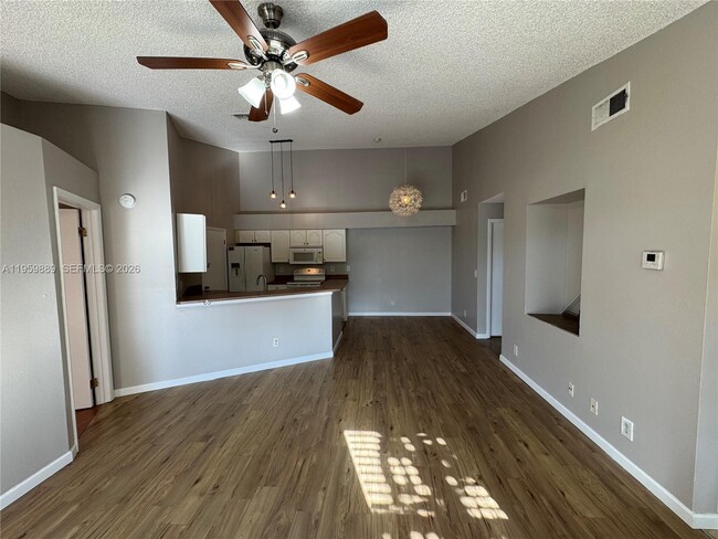 Building Photo - 9999 Summerbreeze Dr Unit 108