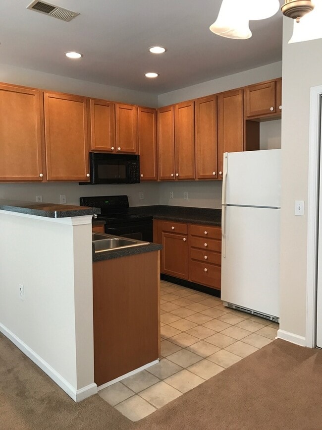 Photo - Adorable 1 bedroom 1 bath condo with garag...