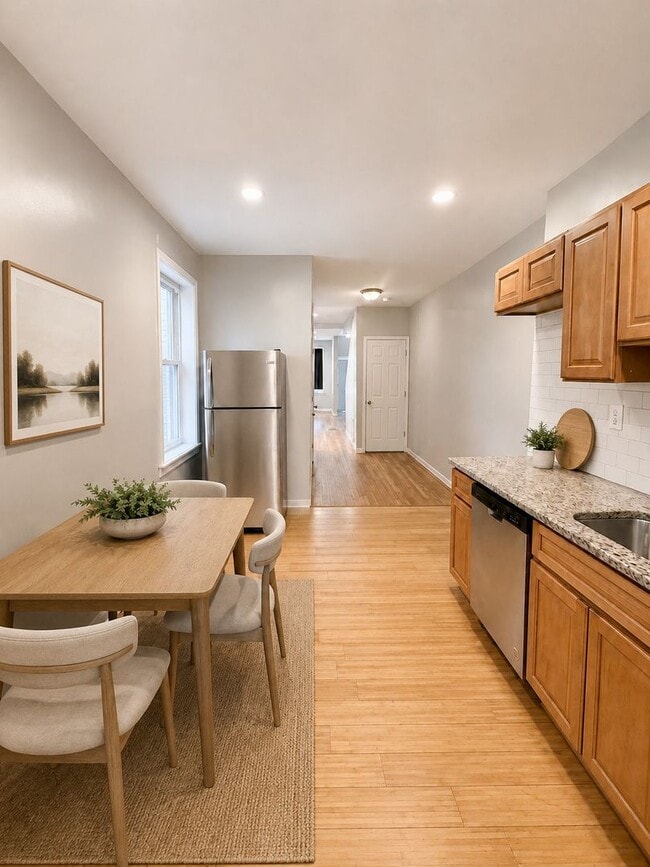 Photo - Spacious 5-Bedroom Rental with In-Unit Washer & Dryer on W Oxford St