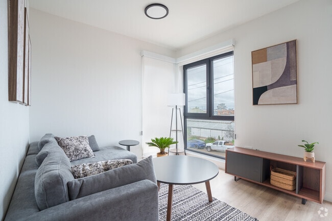 3BR, 2BA - 715SF - Living Room - Collab@Oxford