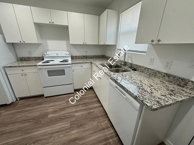 Photo - Spacious and updated 2 bedroom 2 bathroom apartment for rent. Central heat and air, granite count...