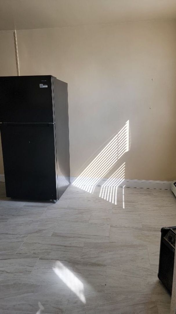 Photo - 7703 Woolston Ave Unit 2