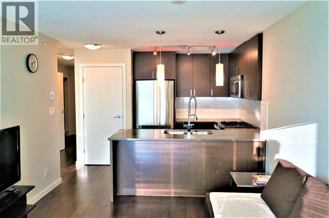 Photo - 7117 Elmbridge Way Unité 705