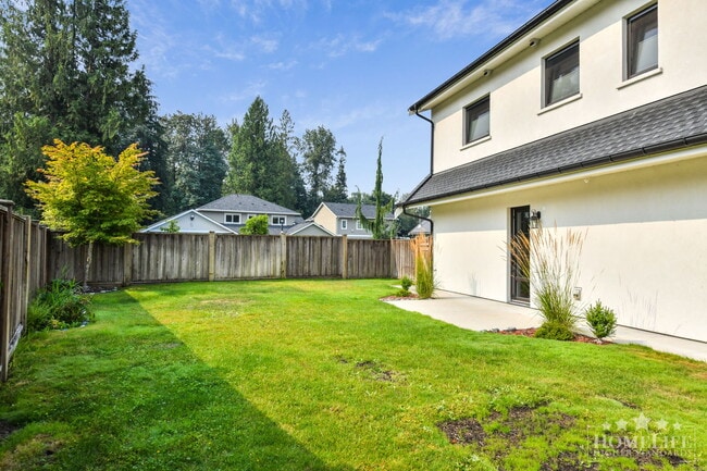 Spacious Executive 3-Bedroom Suite with Private Yard & Utilities Included