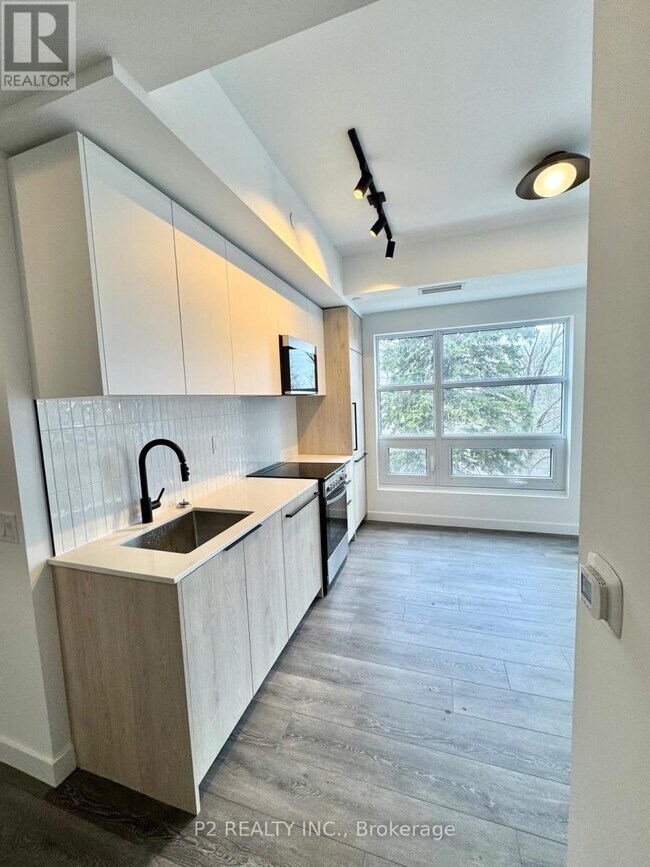 Photo - 1635 Military Trail Unit 203