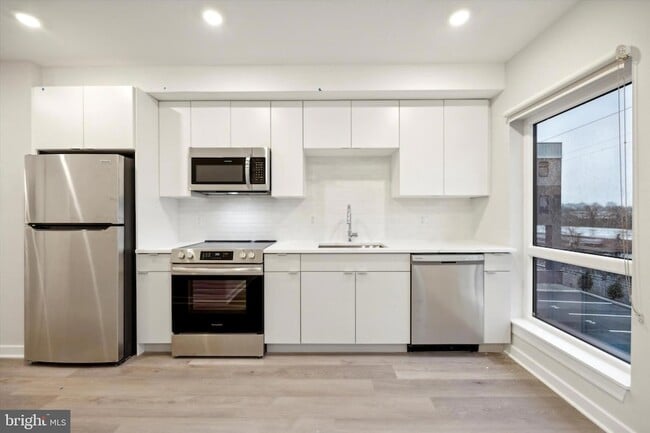 Building Photo - 3449 Scotts Ln Unit A206