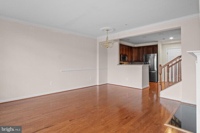 Photo - Townhome style condo features 3 bedrooms, 2.5 baths, and a lower level garage Unidad 821