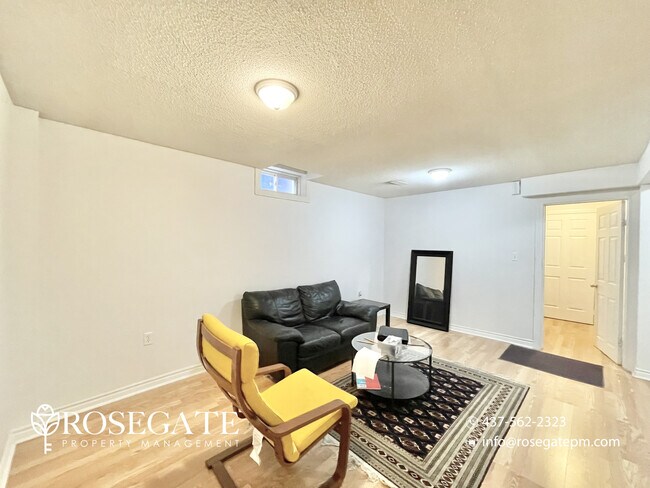 Photo - Spacious 2-Bedroom Basement Apartment with... Unit 2