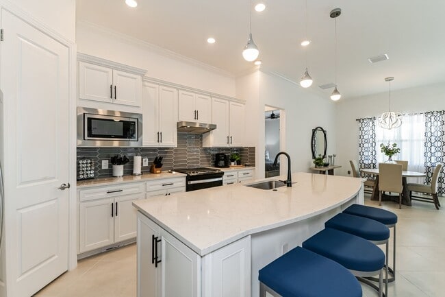 Photo - Luxury Turnkey 3BR + Den / 3BA Pool Home in Greyhawk at Golf Club of the Everglades