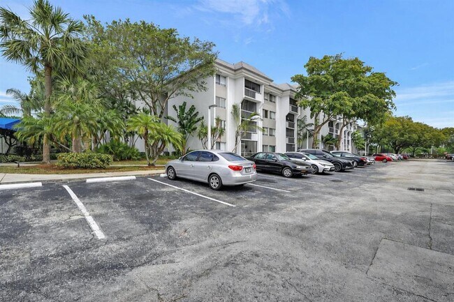 Photo - 711 N Pine Island Rd Unit #210