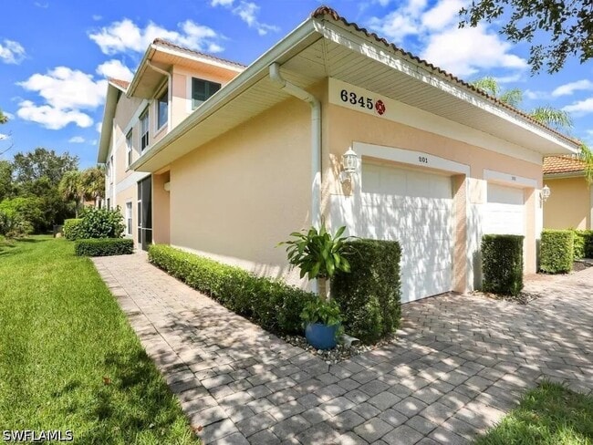 Building Photo - 6345 Lexington Ct Unit 201