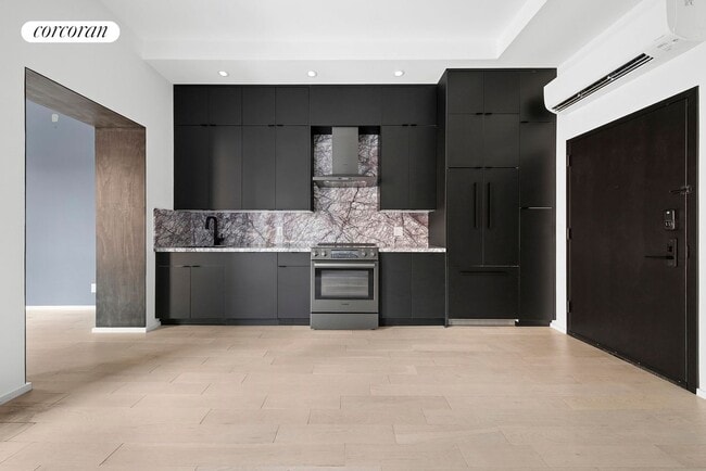 Photo - 317 W 51st St