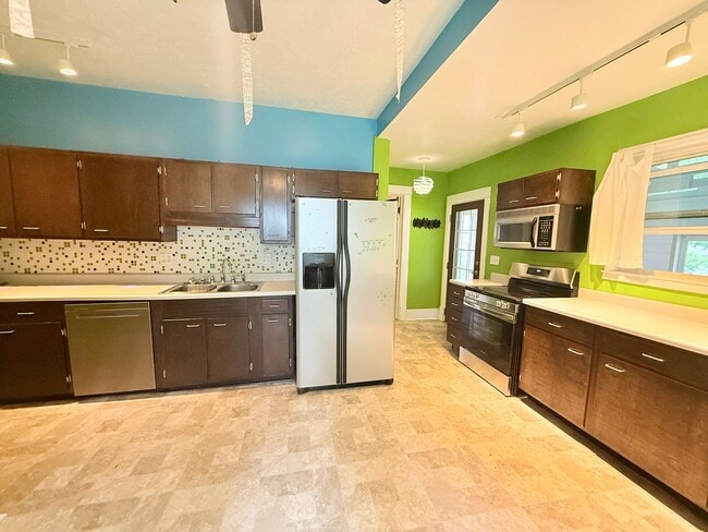 Photo - Beautifully Updated 3BR Home with Bonus 3-Season Room & Fenced Yard