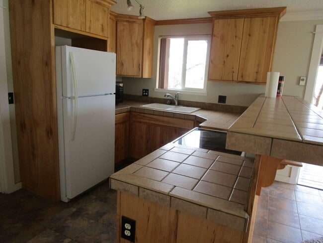Photo - 1 Bedroom Unit with Gate Privacy - All Utilities Provided, Including Yard Care and Internet!