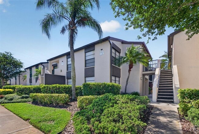 Building Photo - 2597 Countryside Blvd Unit 209