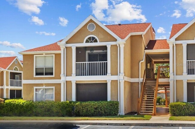 Building Photo - 9481 Highland Oak Dr Unit 305