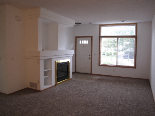 Photo - Townhome with Loft, Fireplace & Large Walk-In Closet. Trash and water included– Available May 1