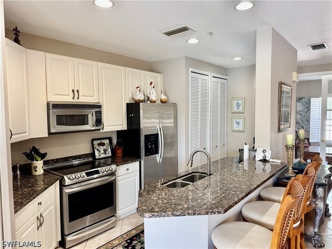 Building Photo - 1390 Sweetwater Cove Unit 203