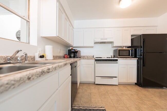 Photo - Stylish & Fully Furnished 2-Bedroom in the Heart of Farmington – Flexible Lease Terms! Unit 2