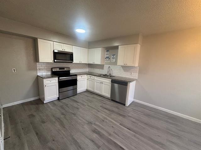 Building Photo - 327 SE 3rd St Unit 103