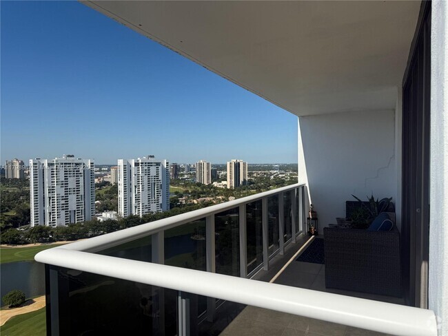 Building Photo - 3625 N Country Club Dr Unit PH5 Rental