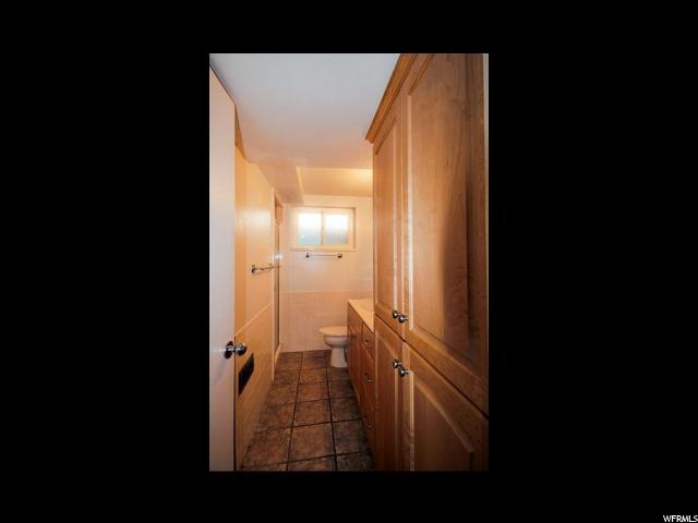 Bathroom with deep shower and lots of storage - 1319 Westminster Ave S Unit Main Level