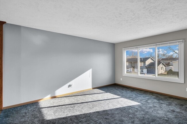Photo - Spacious 4-Bedroom Home with Fenced Yard a...