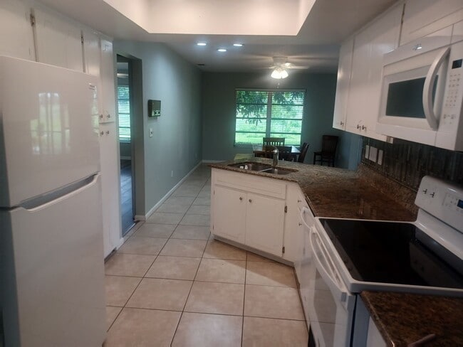 Photo - Spacious, Newly Remodeled  3 bedroom, 2 bathroom screened lanai GREAT LOCATION