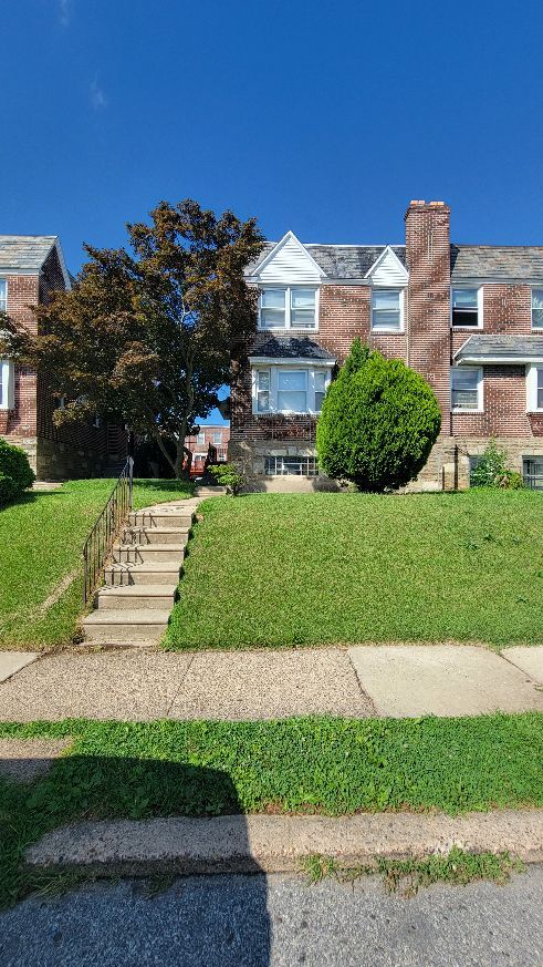 Building Photo - 7703 Woolston Ave Unit #1