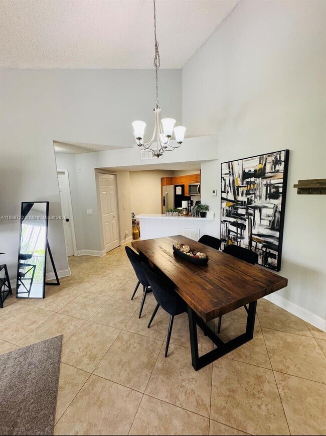 Photo - 8821 Wiles Rd Unit 305