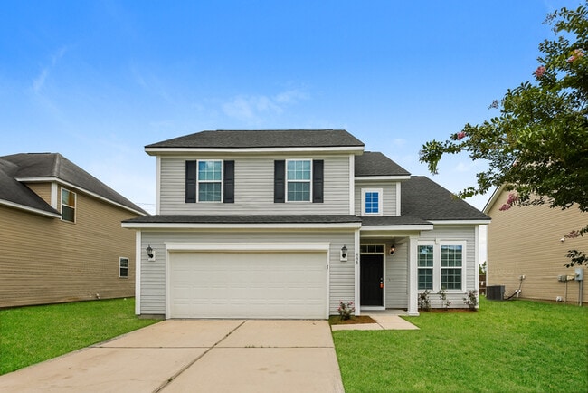 Building Photo - Inviting 4 Bedroom home with Great Location