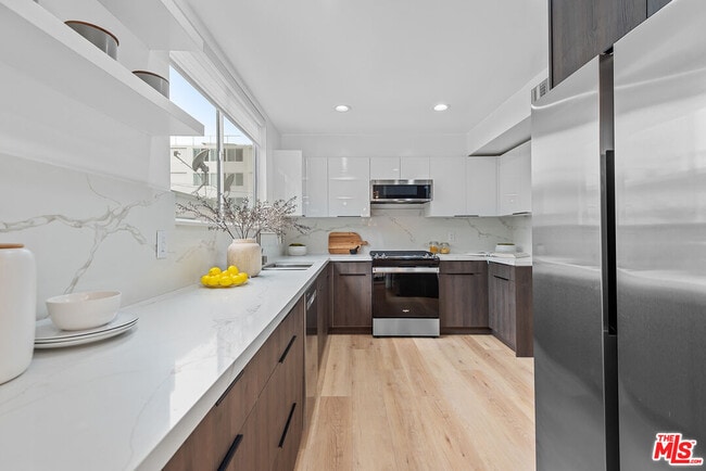 Photo - 301 Rexford Dr Unidad 6