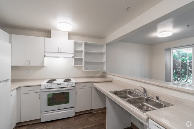 2BR, 1BA - 1049SF - Kitchen - Family Tree Apartments