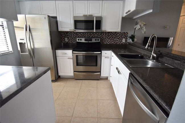 Photo - 10177 Sailwinds Blvd S Unit 203