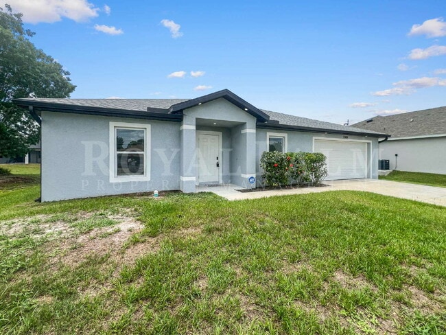 Photo - 4BR/2BA Home with High Ceilings, Garage & Large Kitchen Island