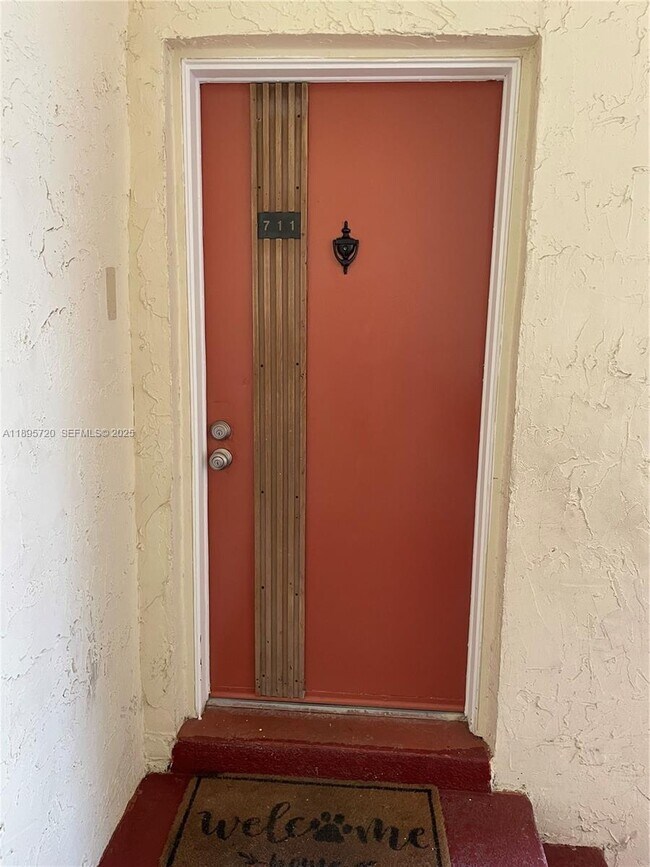 Building Photo - 8550 SW 149th Ave Unit 711