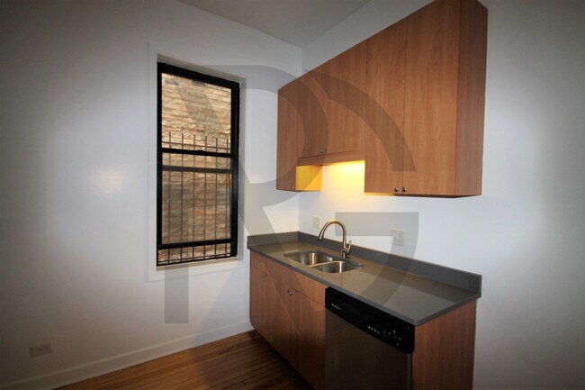 Photo - 2140 W Concord Pl Apartments Unit #2134-1R