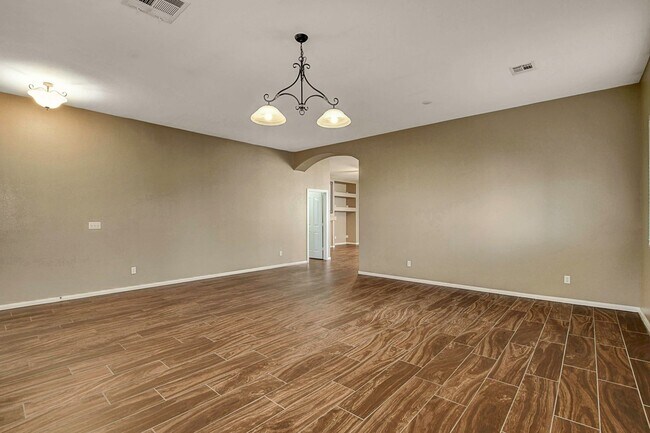 Photo - Gorgeous NW Single Story! 3 Car Garage! Serene Backyard.