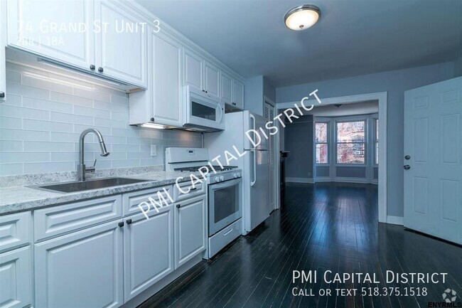 Building Photo - Luxurious, Modern 2 bedroom w/ Den and Cen... Unit 3 Rental