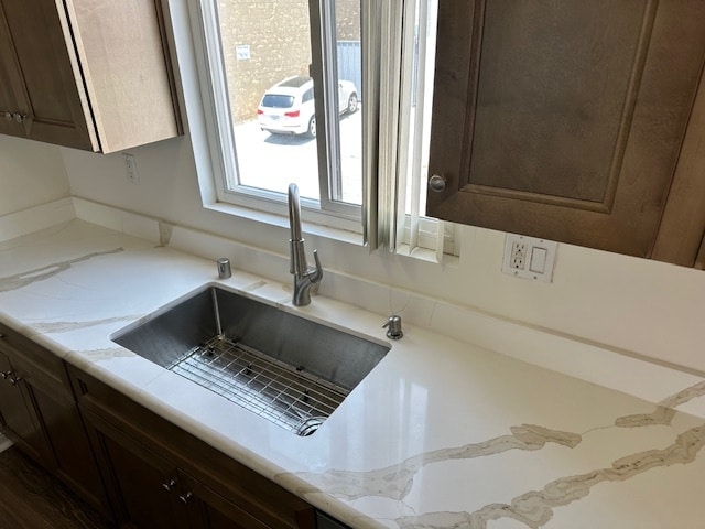 Bright countertops, modern cabinetry, and deep sink - 5510 Adelaide Ave Unit e 11