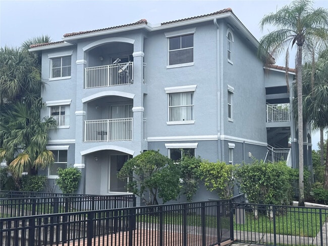 Building Photo - 9640 NW 2nd St Unit 5-302