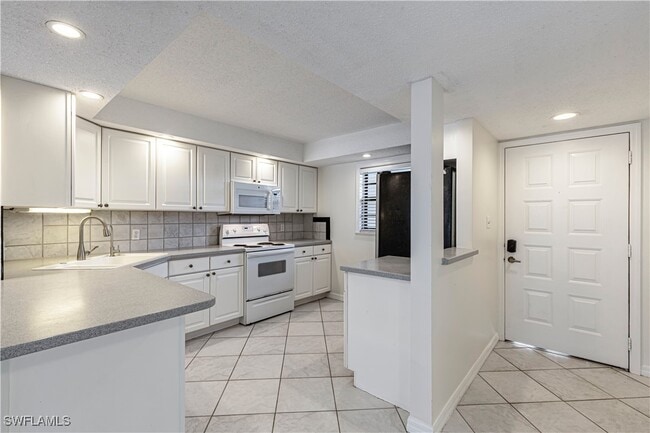 Building Photo - 9395 Pennsylvania Ave Unit 24