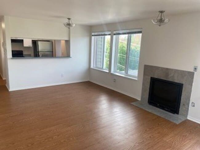 Photo - Queen Anne west facing 1 Bedroom patio secure building and garage Unit 201