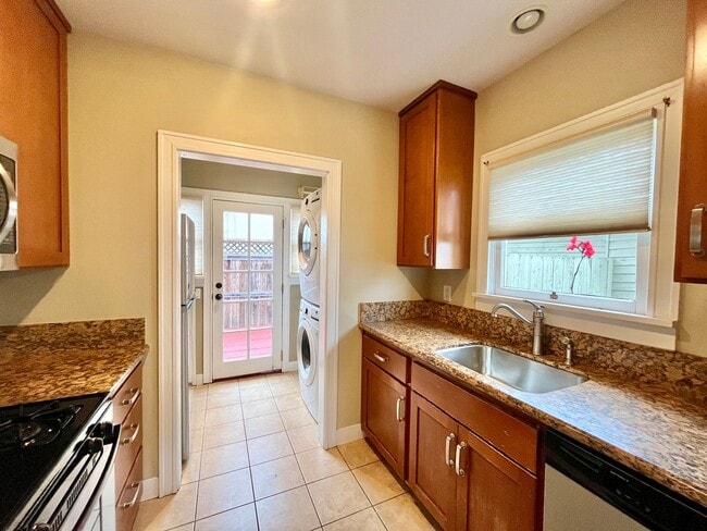 Photo - 2 Bedroom/1 Bathroom Single Family Home with 1-Car Garage and Laundry