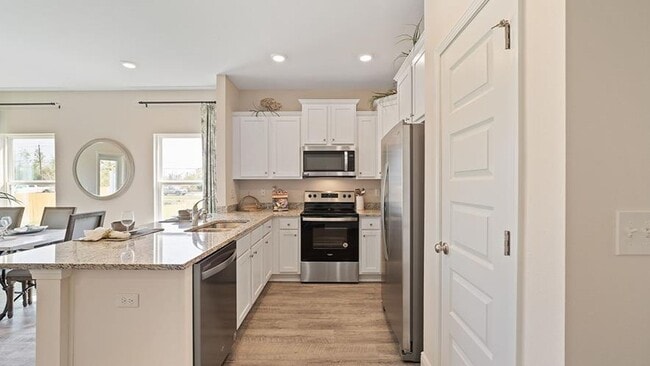 Photo - Modern 3BR/2.5BA Home with Open Floor Plan, Granite Counters & 1-Car Garage – Valdosta, GA