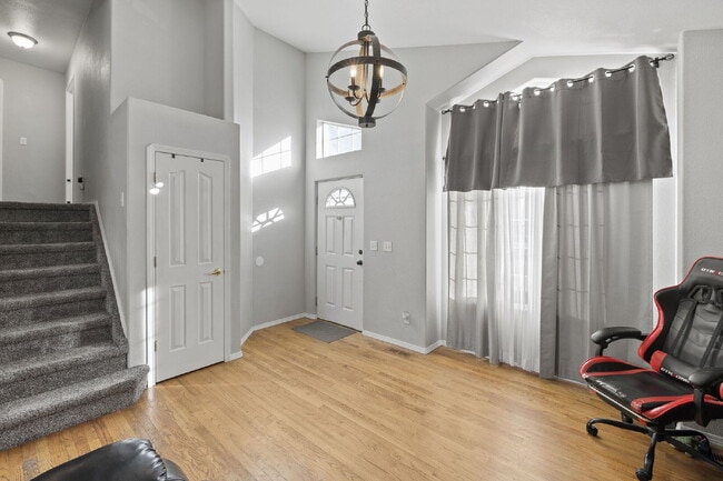 Photo - Bright & Spacious 4-Bedroom Home with Open-Concept Living, Fenced Yard & 2-Car Garage