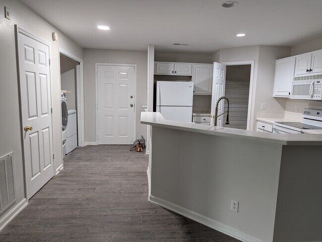 Entry, Laundry and kitchen - 5004 Hunters Trail Unit 14
