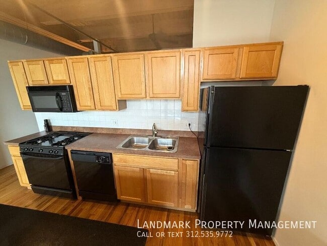 Building Photo - 1250 W Van Buren St Unit 202