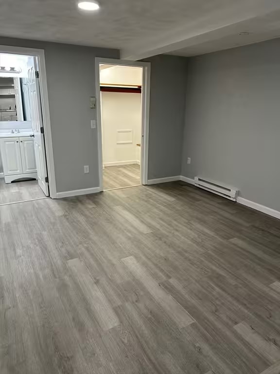 bedroom with closet - 592 Beach St Unit 7