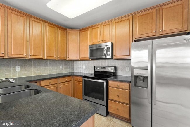 Building Photo - 803 Reserve Champion Dr Unit 203